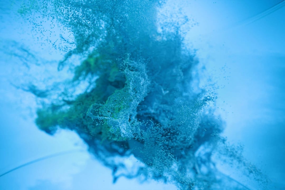 Chemical particles forming a cloud.